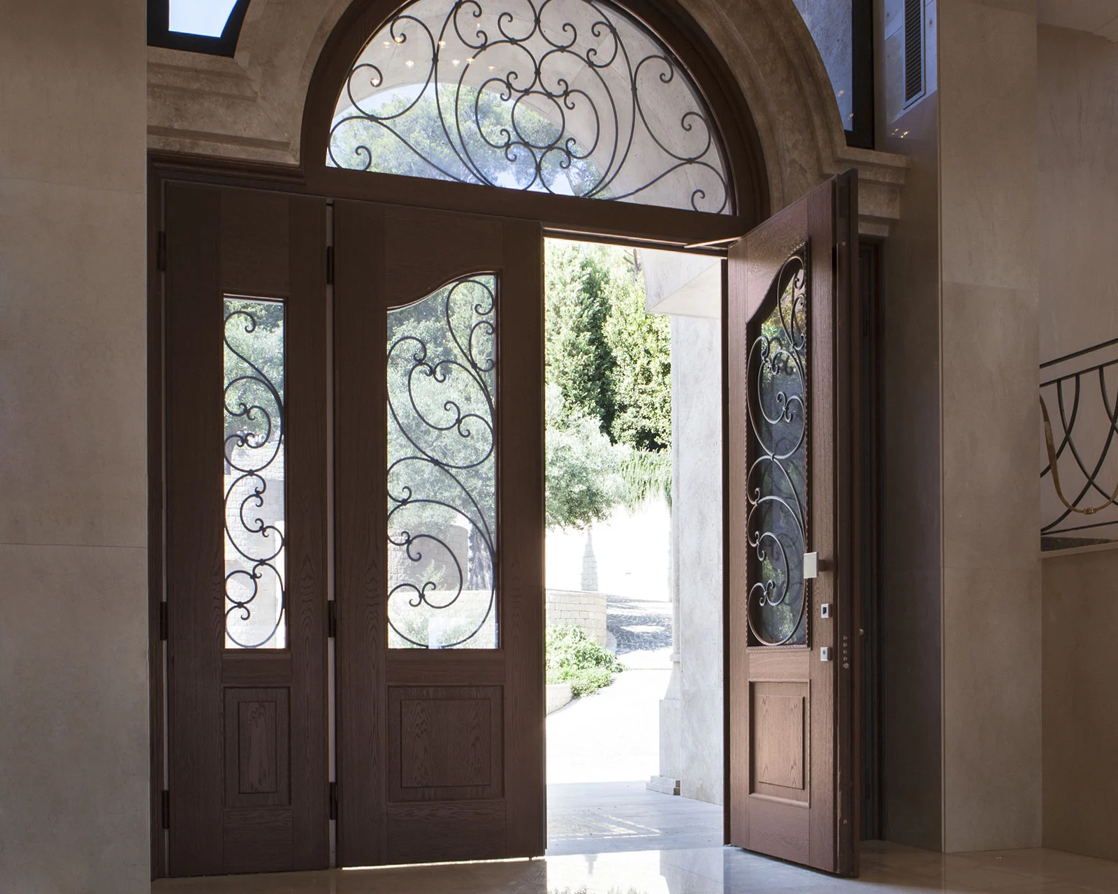 Oikos Evolution entrance in a traditional architectural setting.