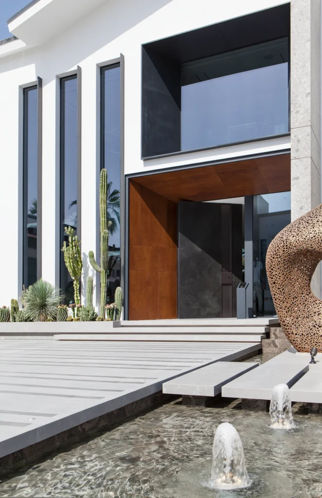 Villa 11 in Dubai: entrance facade alongside the water feature.