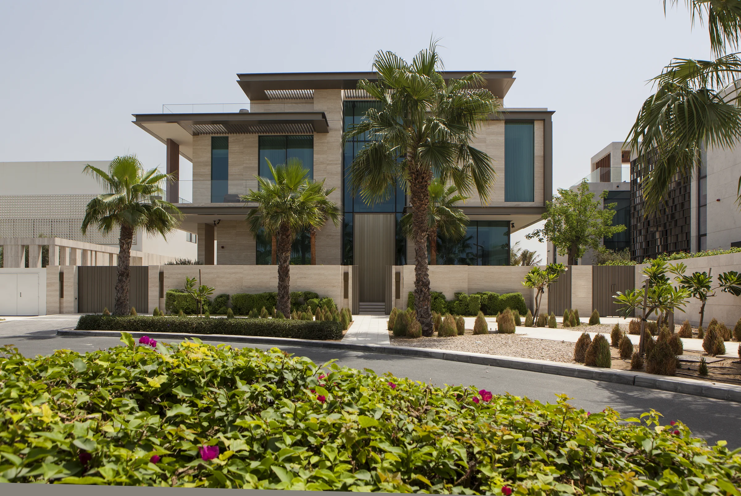 Villa 12 in Dubai: villa facade and landscaped approach.