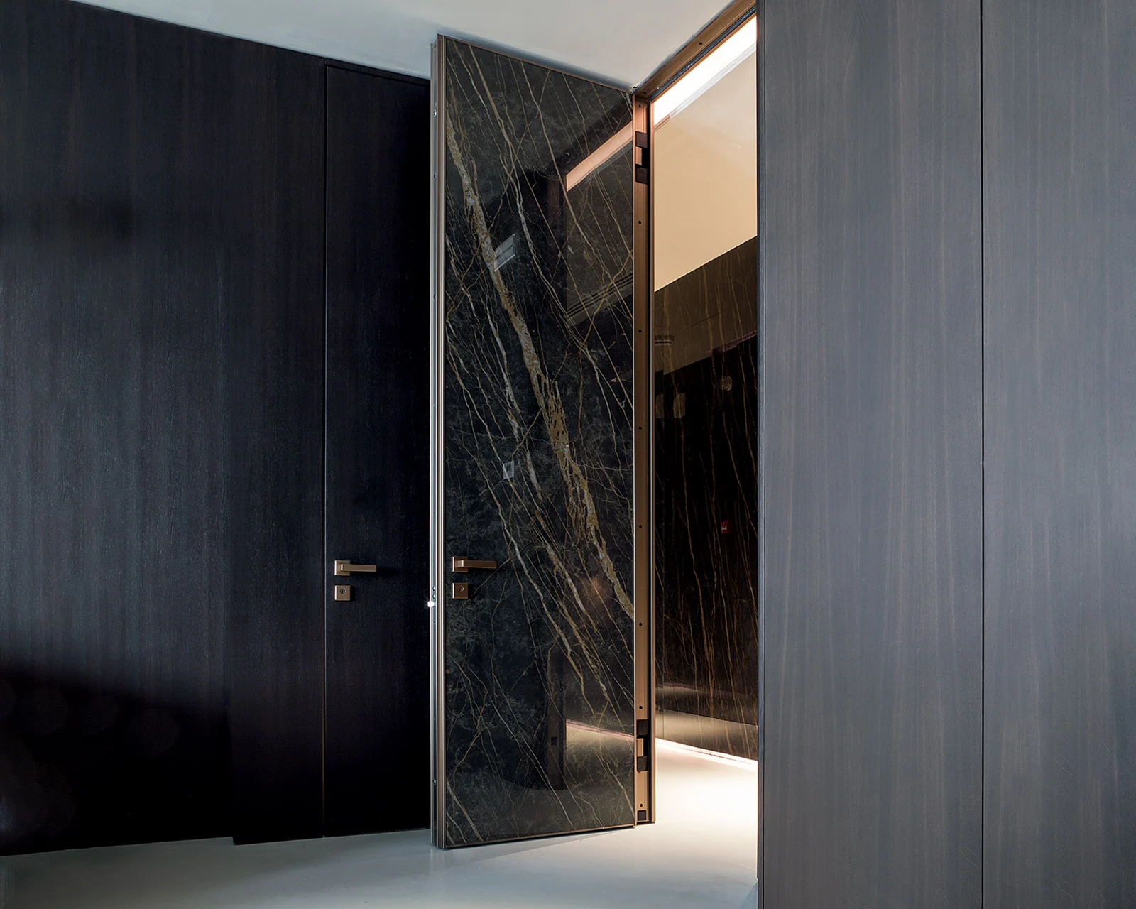 Oikos Project interior security door integrated into a wall.