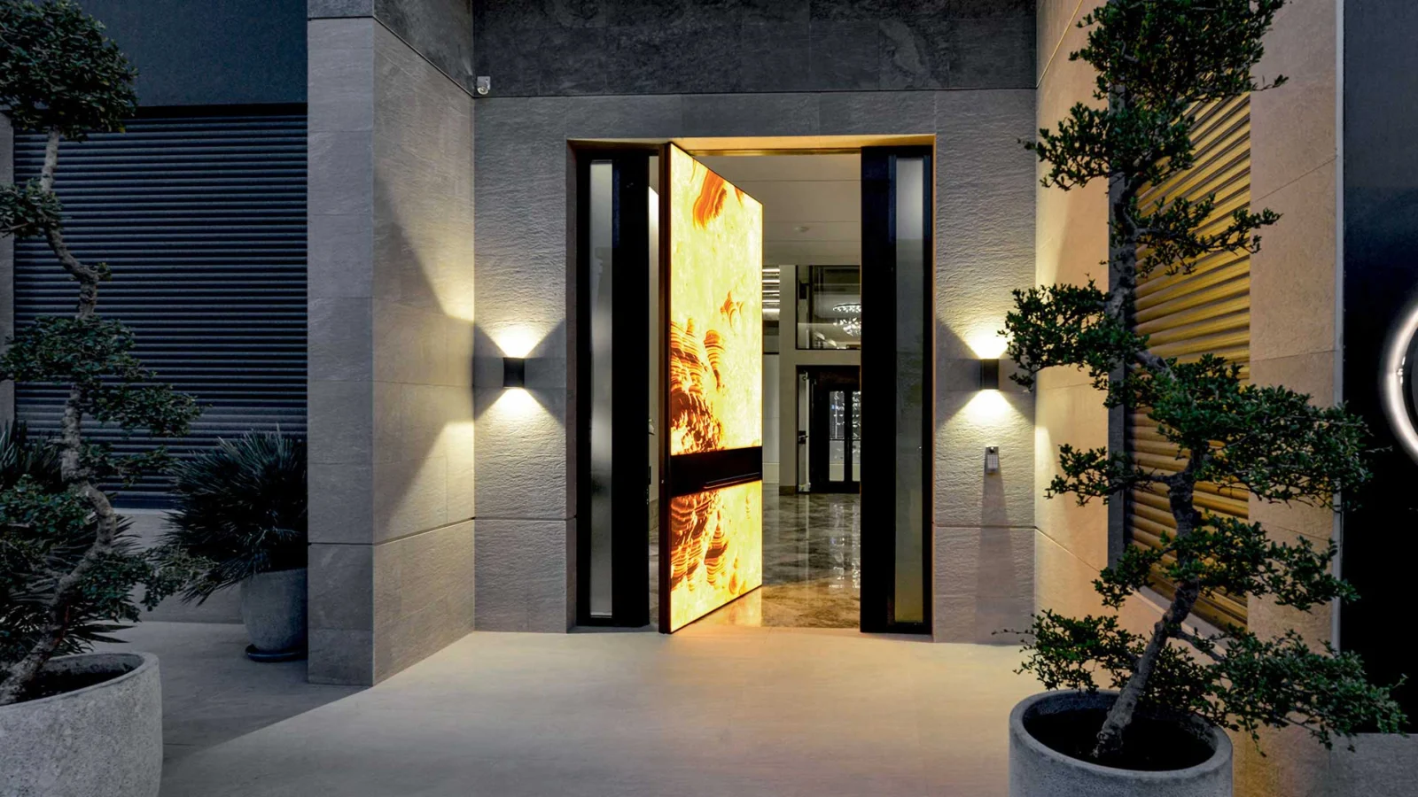 Oikos Synua door with illuminated onyx covering.